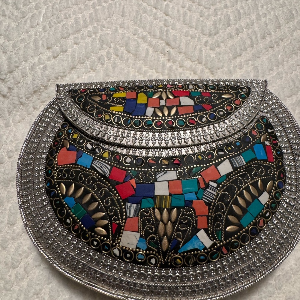 Brand new Ramla metal and ceramic clutch purse.
